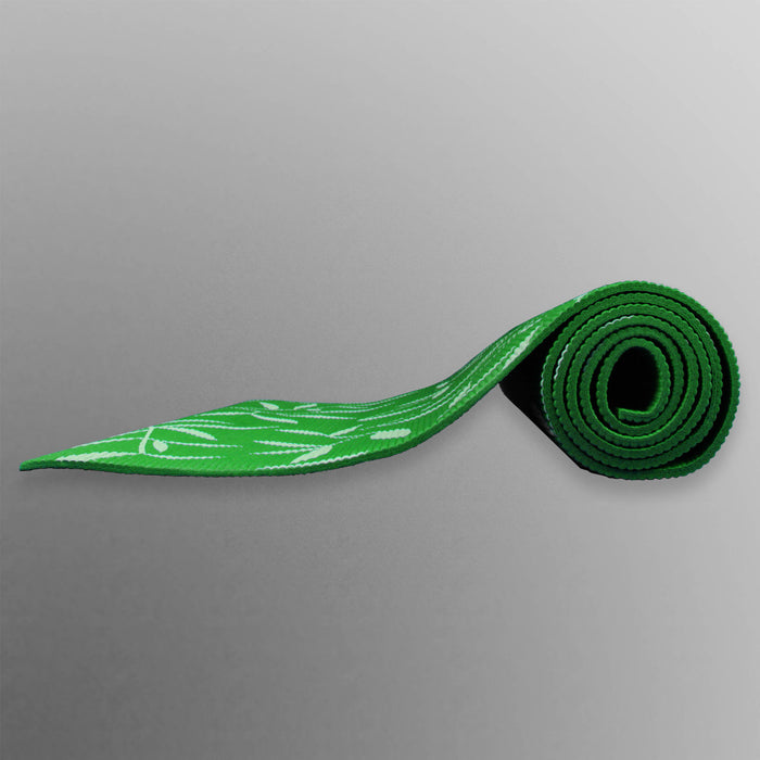 green rolled up yoga mat