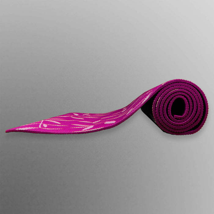 purple rolled up yoga mat