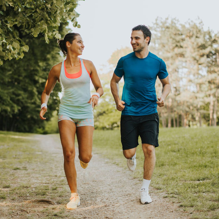 a couple running in the park