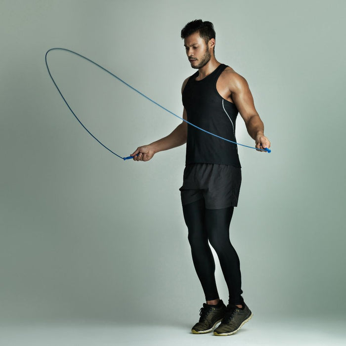 a man with skipping rope doing cardio