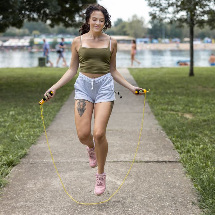 a woman skipping in the park